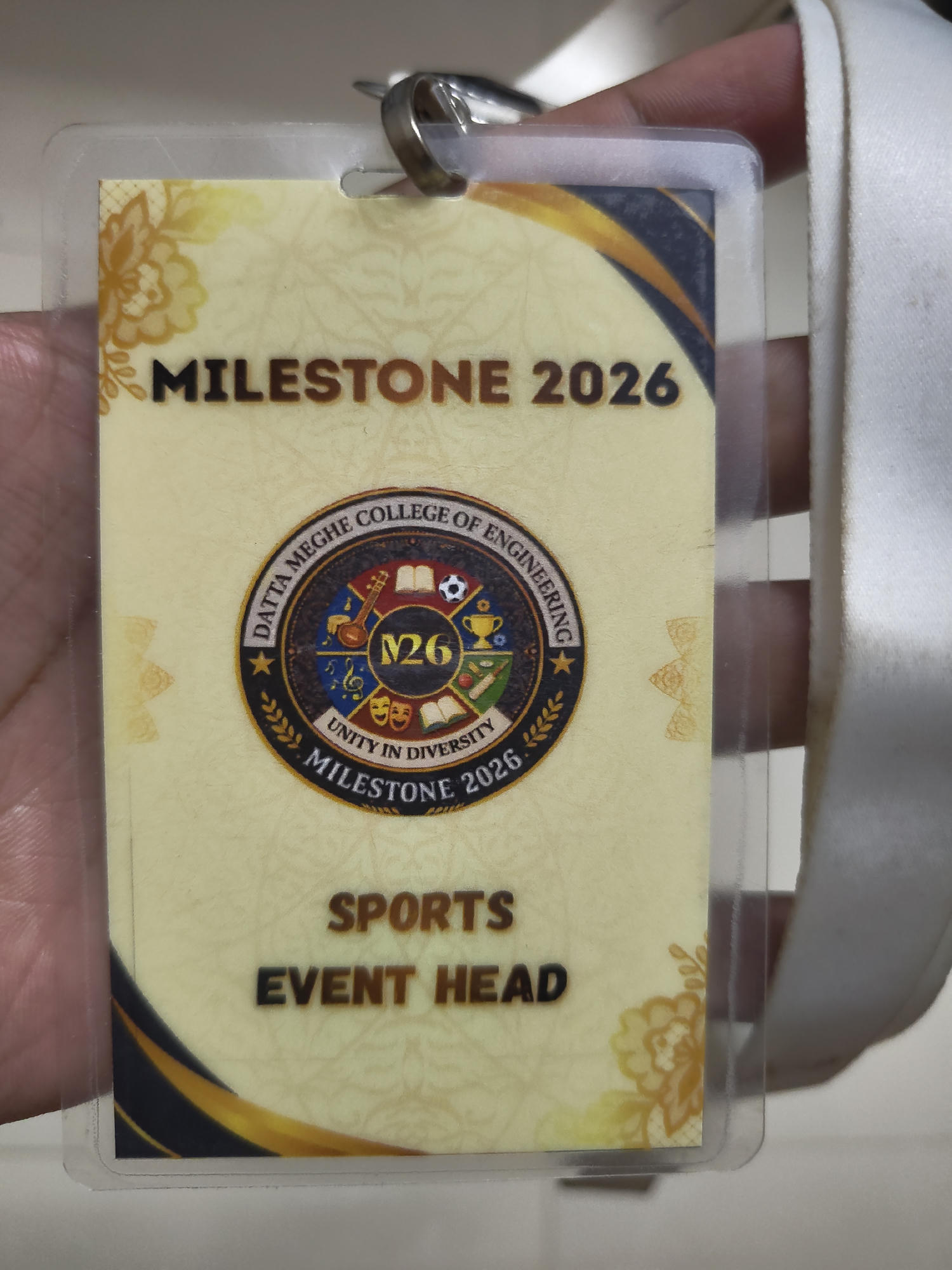 Football event head identification badge for Milestone ’26